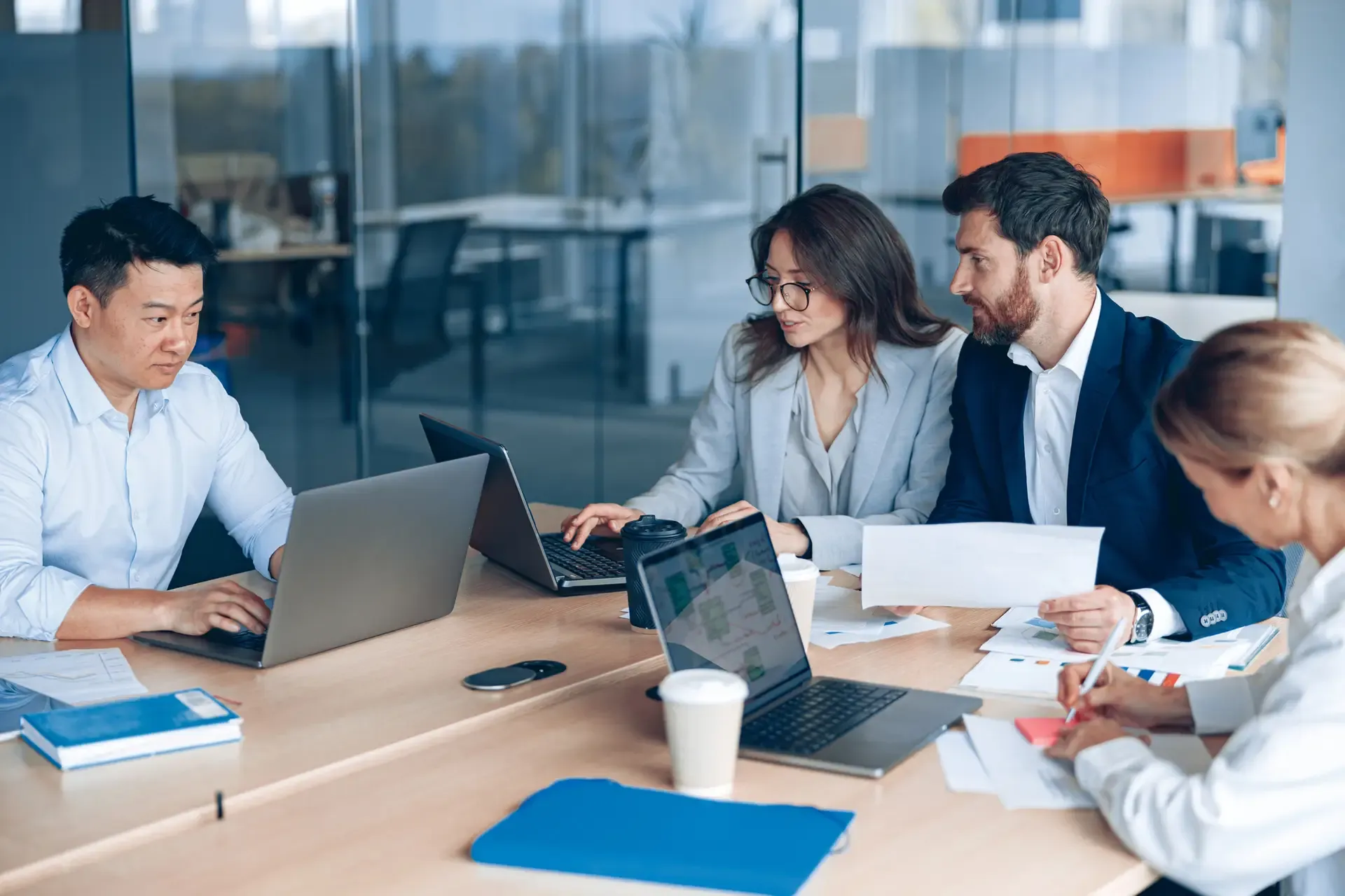 A hiring team reviewing candidate shortlists together